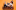 DONUTS_WebBanner_Clean Two people jumping onto a sofa